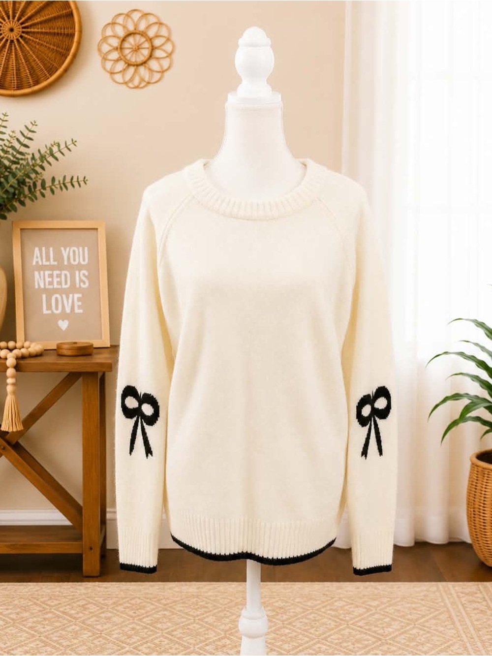 Maurices Cream Sweater with Black Bow Sleeve Accents